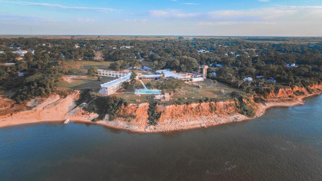 an aerial view of a house on an island in the water at Tramonto hotel & ristorante in Empedrado