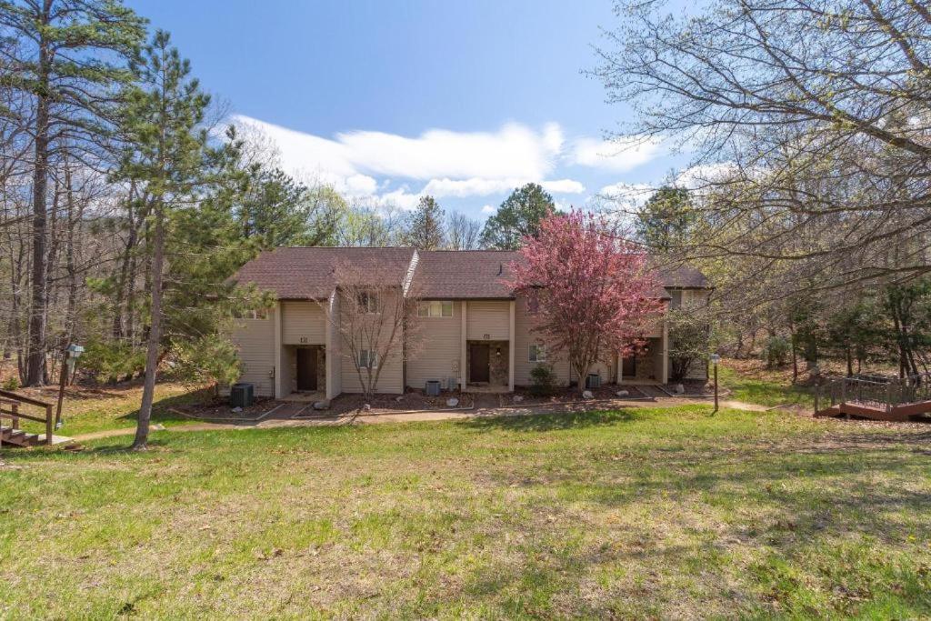 a house with a large yard in front of it at Mountainside Villas in McGaheysville