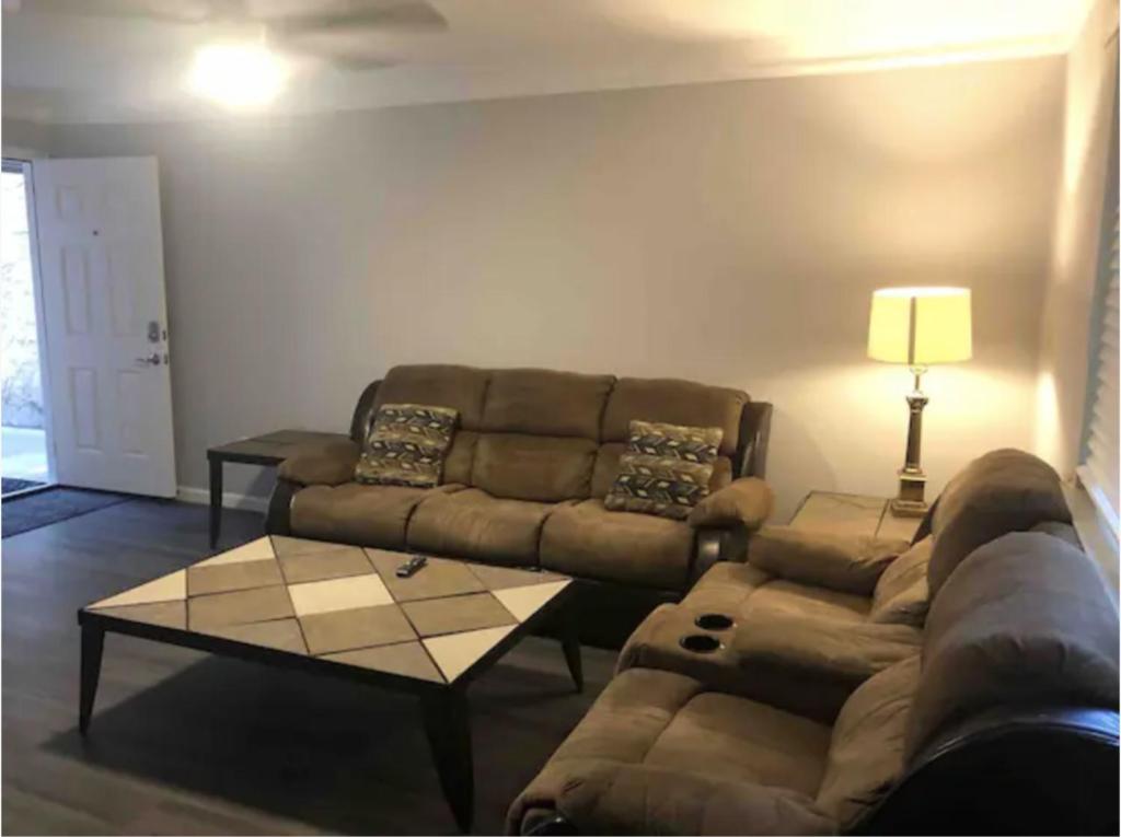 a living room with a couch and a coffee table at 3Bed 2Bath PRIVATE HOME Decatur in Decatur