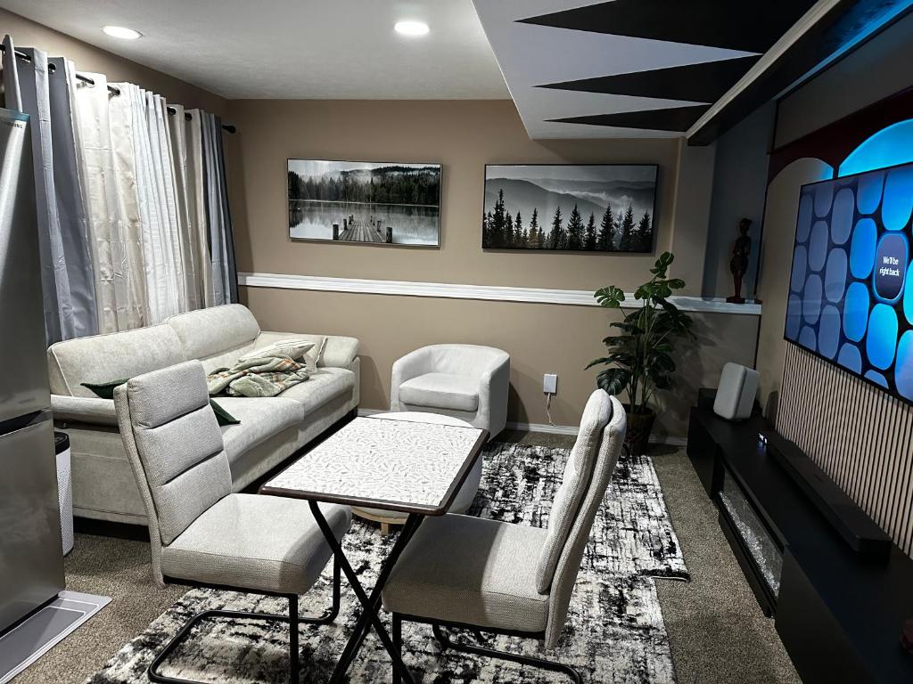 a living room with a couch and a table at apartment unit in Spokane