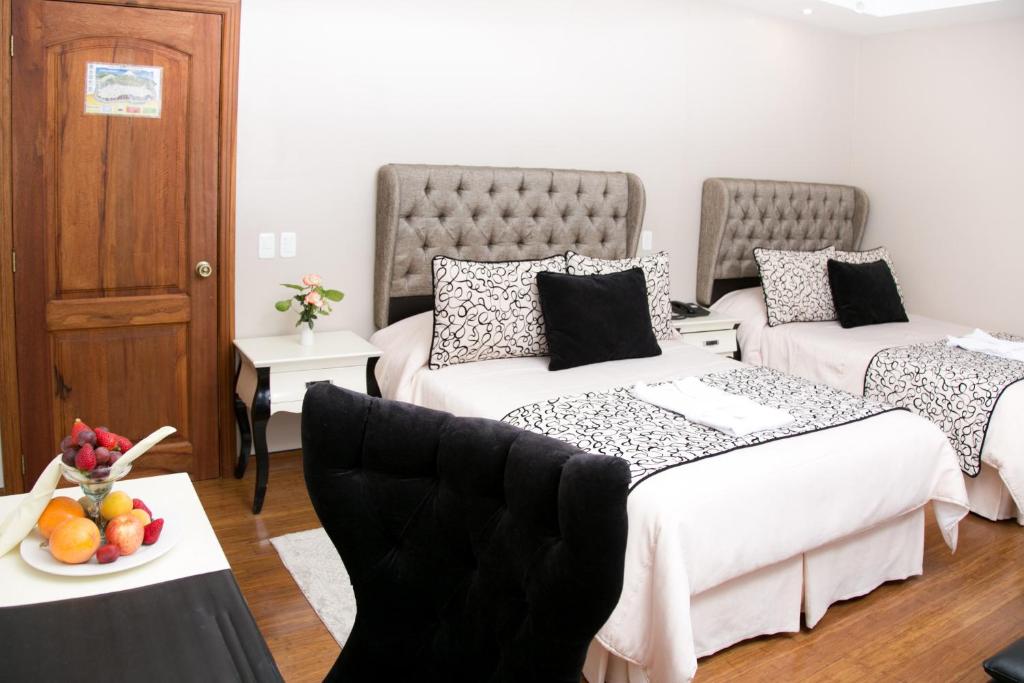 Postel nebo postele na pokoji v ubytování Sangay Spa Hotel