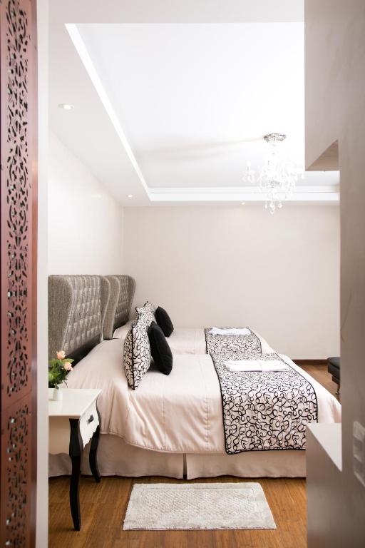 Postel nebo postele na pokoji v ubytování Sangay Spa Hotel