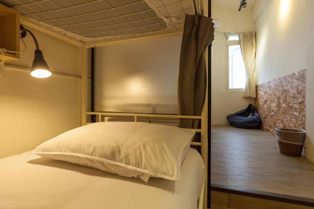 Postel nebo postele na pokoji v ubytování Sleeping Boot Hostel