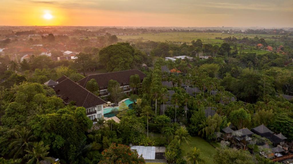 an aerial view of a house with trees at Sanctoo Suites & Villas in Gianyar