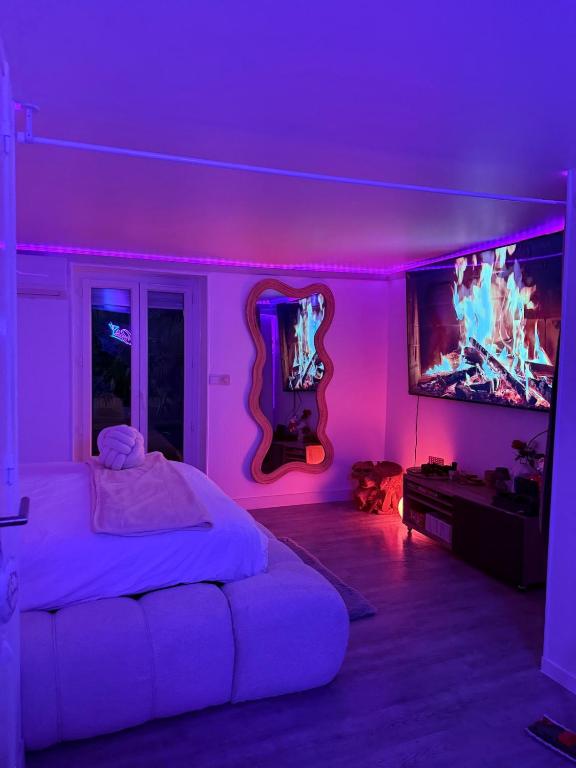 a bedroom with a white bed and a purple ceiling at L'Interdite House - Limitless - Jacuzzi Cinema Love in Savigny-sur-Orge