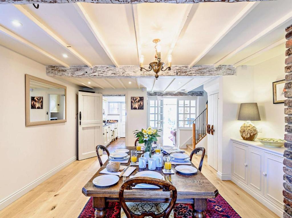 a dining room with a table and chairs at 2 Bed in Driffield oc-75583 in Lund