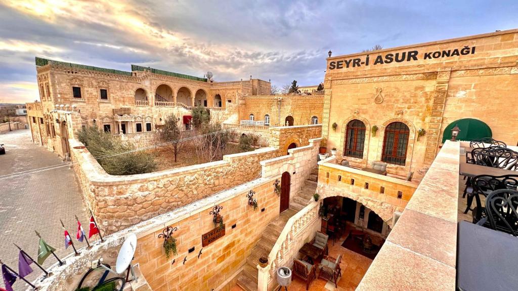 an aerial view of the entrance to a building at Seyr-i asur in Midyat