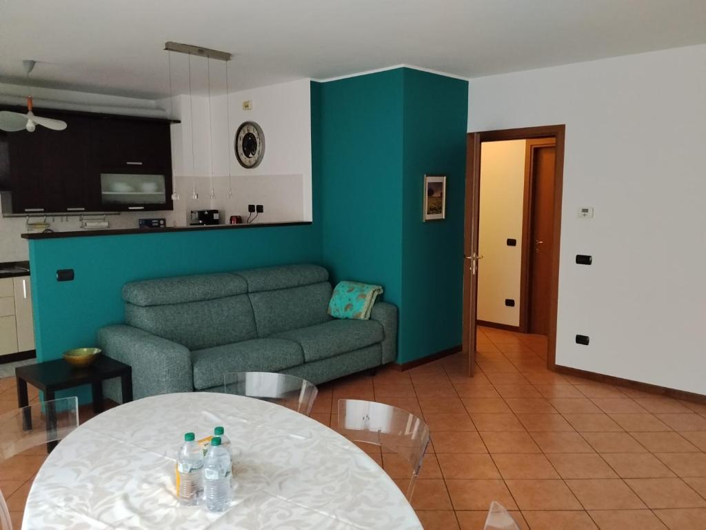 a living room with a couch and a table at B&B Casa Fortunata in Milan