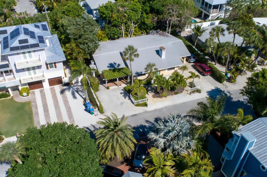an overhead view of a house with palm trees at Palm Haven Beach Side Villa in Holmes Beach