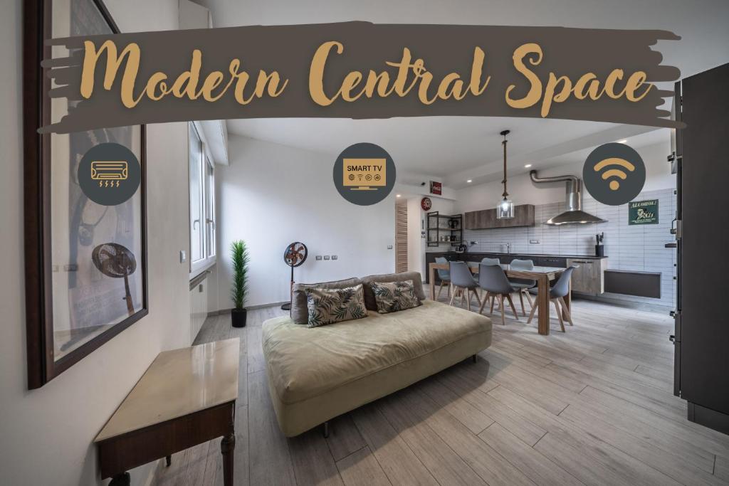 a modern centennial space with a living room and kitchen at Modern Central Space - Mare 5 min - AC - WiFi in Savona