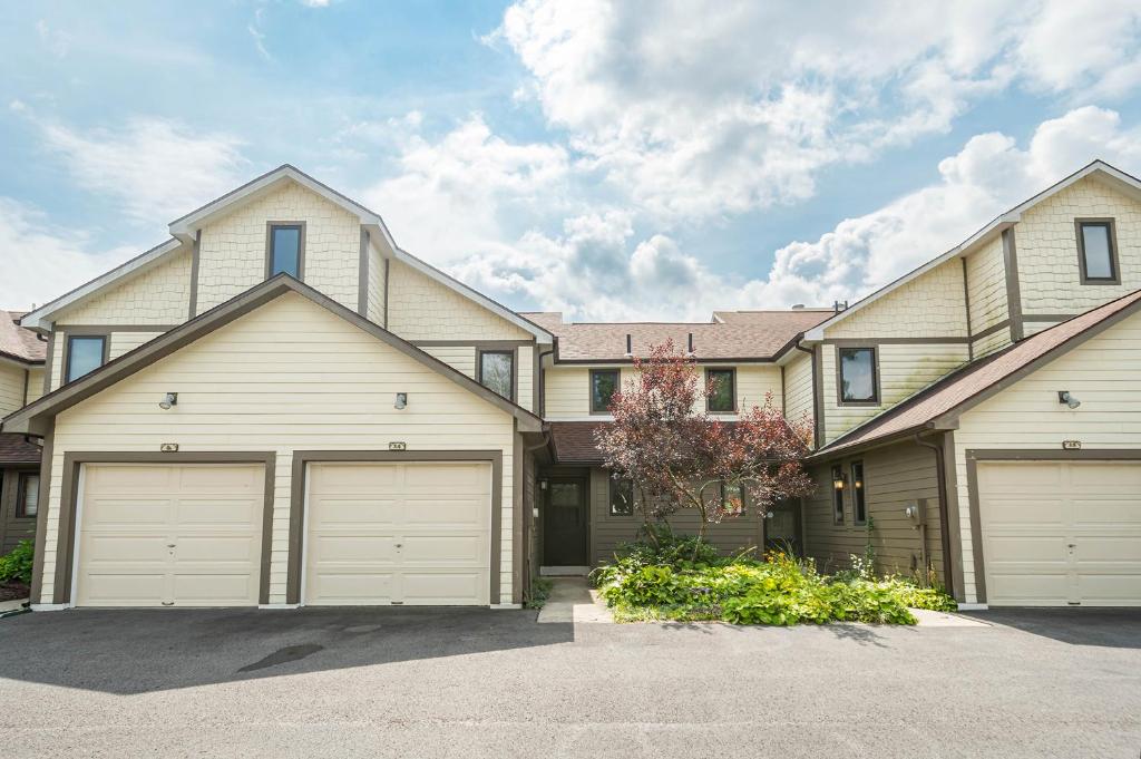 a large house with two garages at Ski Harbor 14 in McHenry