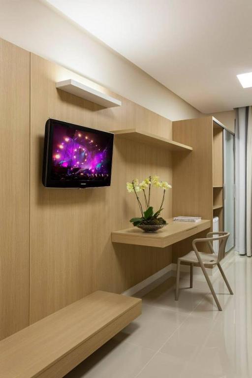 TV a/nebo společenská místnost v ubytování Leopoldo Hotel