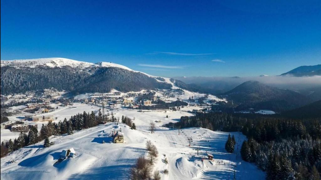 a view of a ski resort in the snow at Donovaly Kamzík in Donovaly