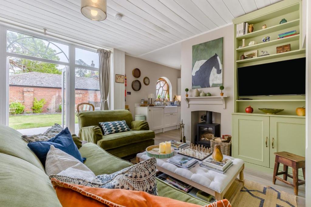 a living room with a couch and a tv at 2 Bed in Tunstead oc-o32203 in Tunstead