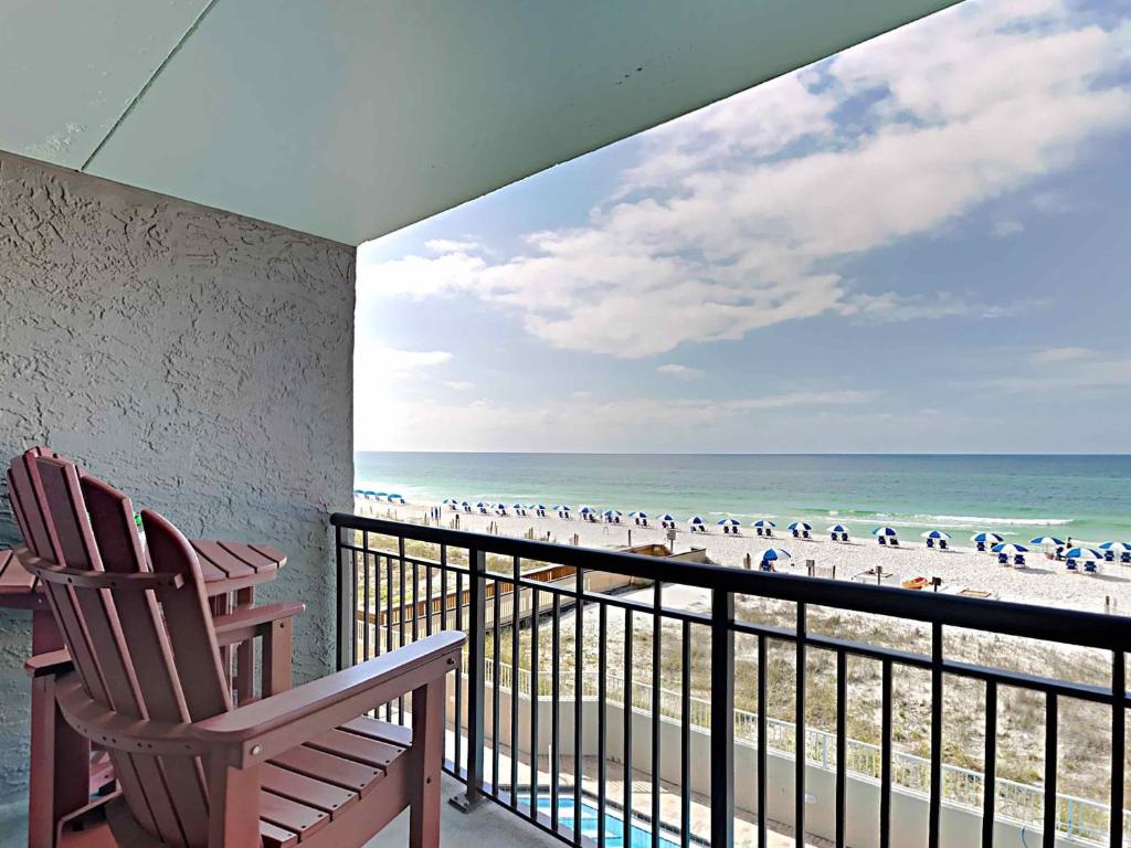 a balcony with a view of the beach at Island Echos #3K in Fort Walton Beach