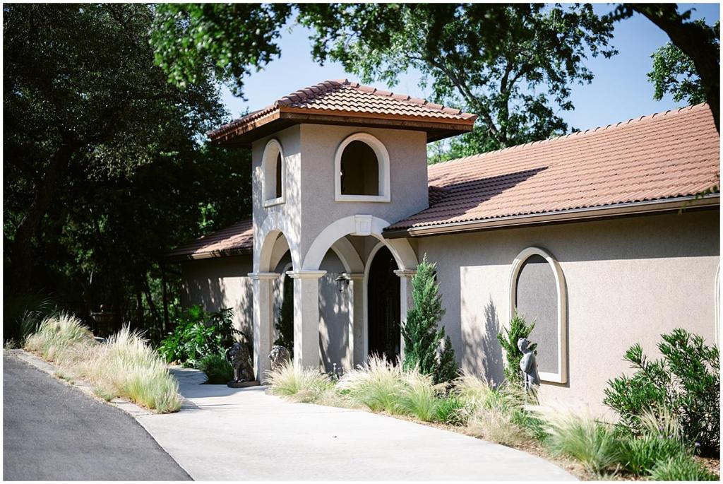 a small house with a tower on top of it at Messina Inn in Wimberley