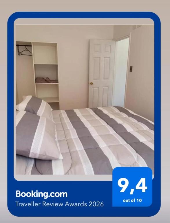a picture of a bed in a room at Cabaña en pleno centro in Valdivia