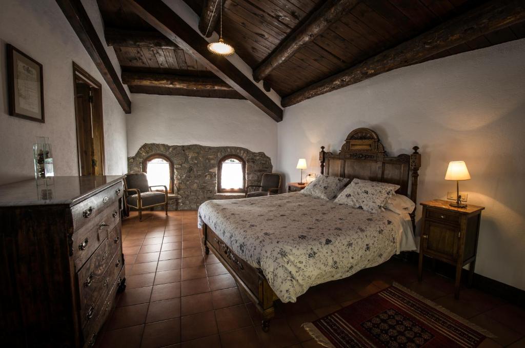 Postel nebo postele na pokoji v ubytování Casa Parramon