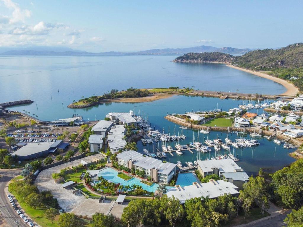 an aerial view of a marina with boats at Peppers Blue on Blue in Nelly Bay