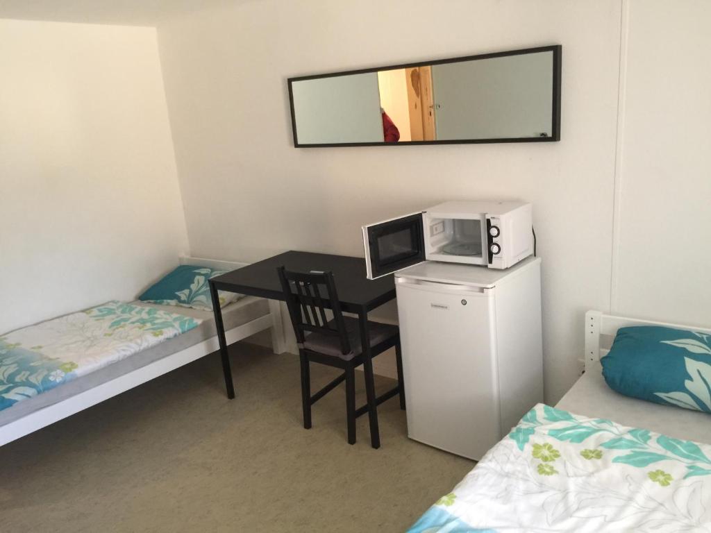 Postel nebo postele na pokoji v ubytování Hostel Airport