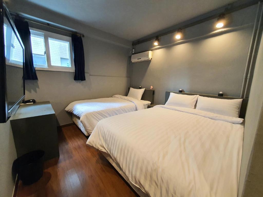 Lova arba lovos apgyvendinimo įstaigoje Daljee Guesthouse
