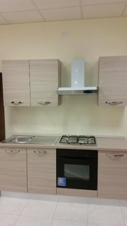 A kitchen or kitchenette at Trastevere four seasons Valadier