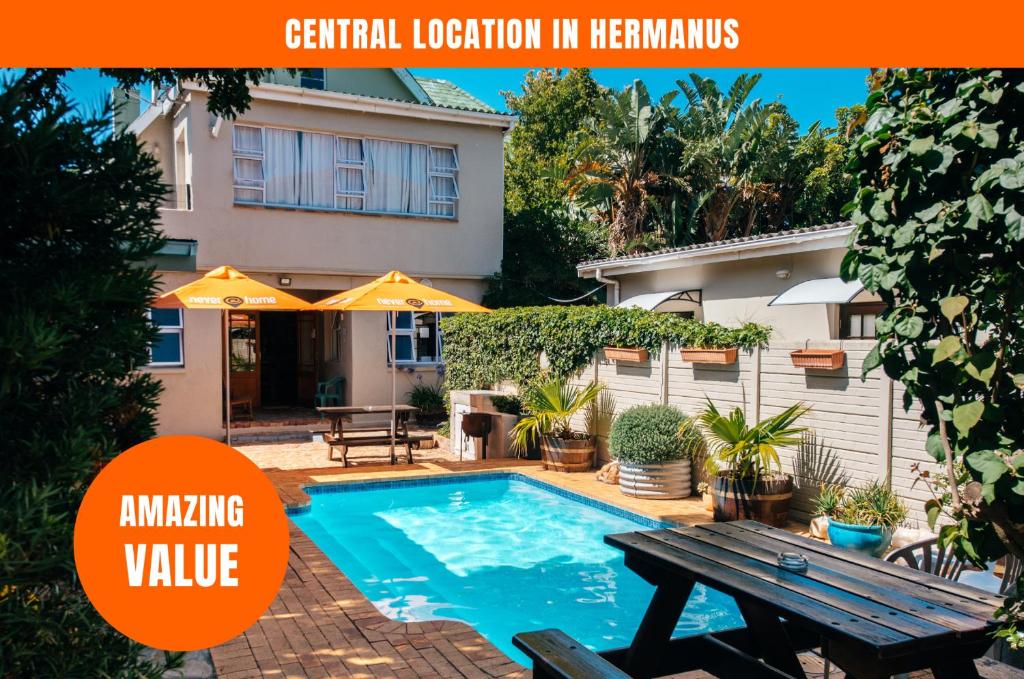 an image of a house with a swimming pool at Hermanus Backpackers & Budget Accommodation in Hermanus