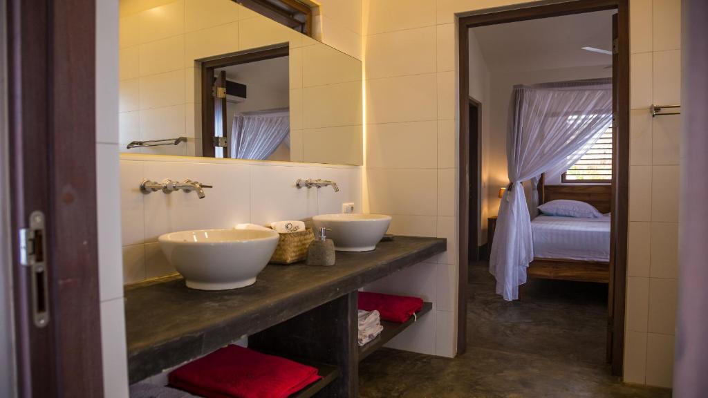 Postel nebo postele na pokoji v ubytování Windhoek Resort Bonaire