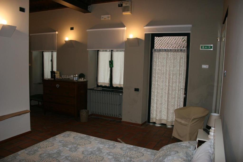 Postel nebo postele na pokoji v ubytování Casa La Ringhera