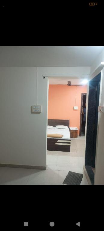 a bedroom with a bed in a room at Blue Sapphire in Hinjewadi