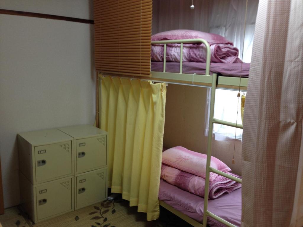 Postel nebo postele na pokoji v ubytování IM guest house