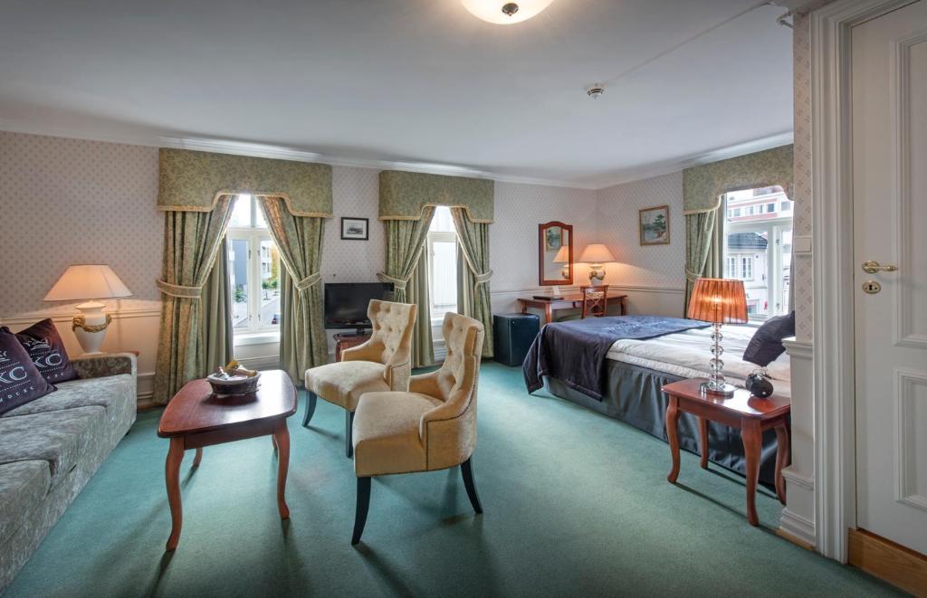 Posezení v ubytování Hotel Kong Carl - Unike Hoteller