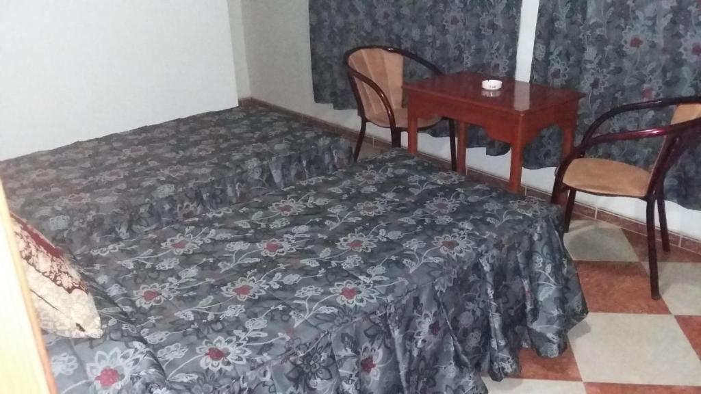 Postel nebo postele na pokoji v ubytování Motel Paris Dakar