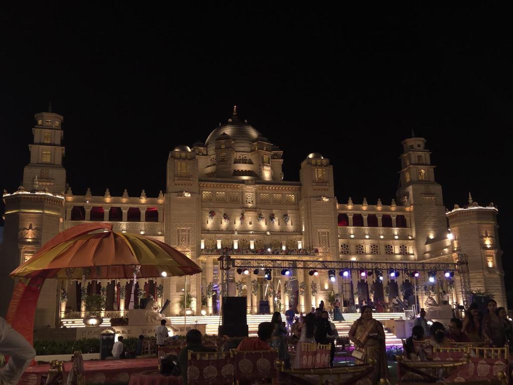 a large building with lights on it at night at Ummaid palace, Siwan in Siwān