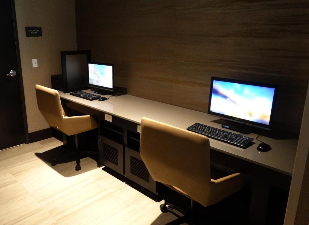 TV a/nebo společenská místnost v ubytování Riverhouse Lodge