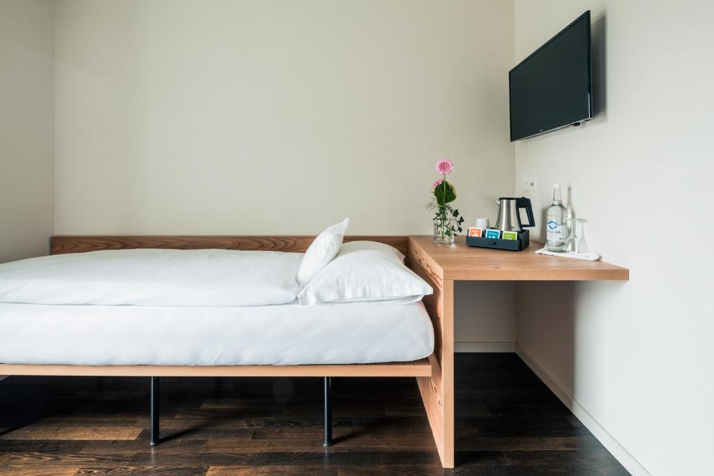 TV a/nebo společenská místnost v ubytování Raselli Sport Hotel