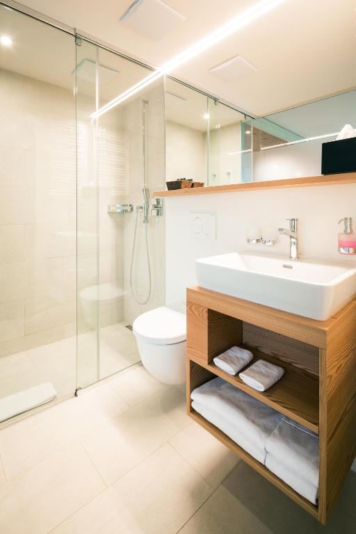 Koupelna v ubytování Raselli Sport Hotel