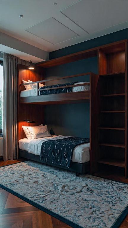 a bedroom with two bunk beds and a rug at MOLELEKI in in Mthatha