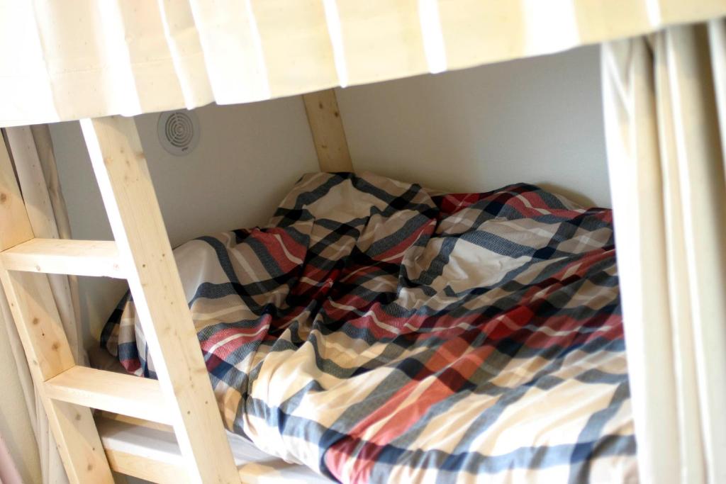 Postel nebo postele na pokoji v ubytování Guesthouse Sensu