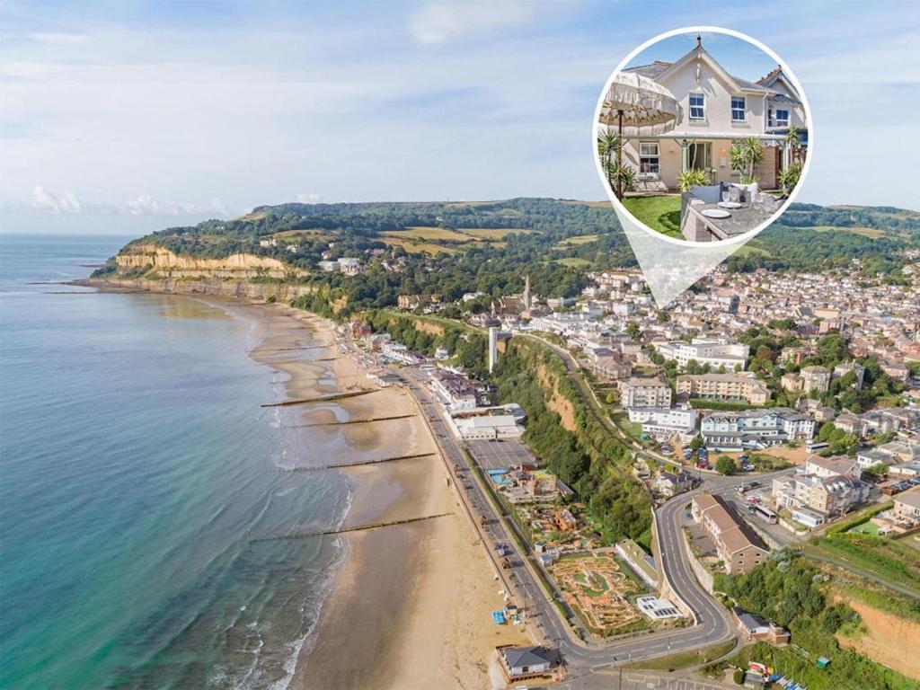a house on a cliff next to the beach at 3 Bed in Shanklin oc-92052 in Shanklin