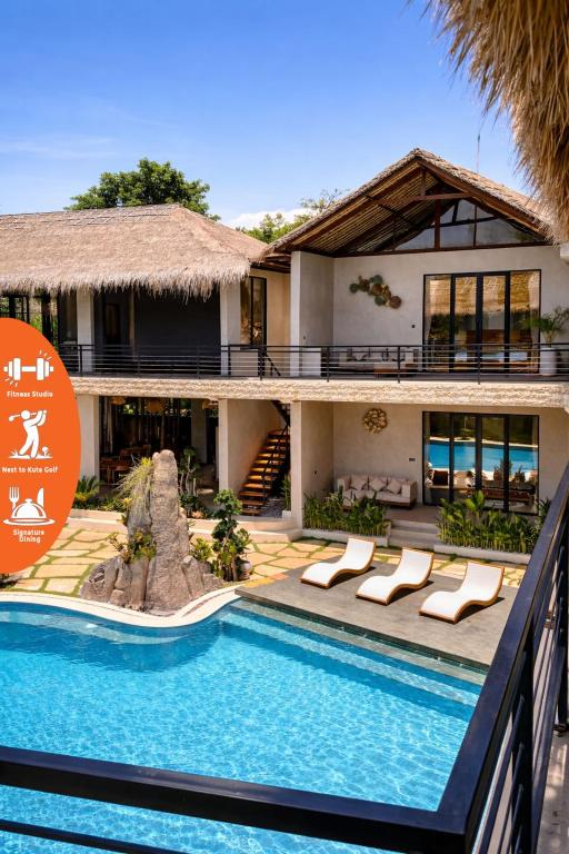 a villa with a swimming pool and a resort at Bella Vida Resort, Uluwatu in Uluwatu