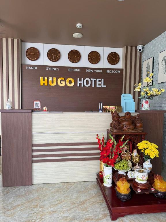 a hico hotel counter with a buffet of food at Hugo Hotel in Phú Quốc