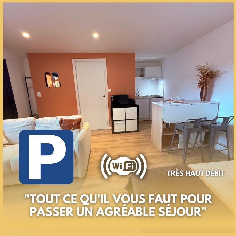 a living room with a dining room and a kitchen at Le Petit Rhuys-parking-wifi in Surzur