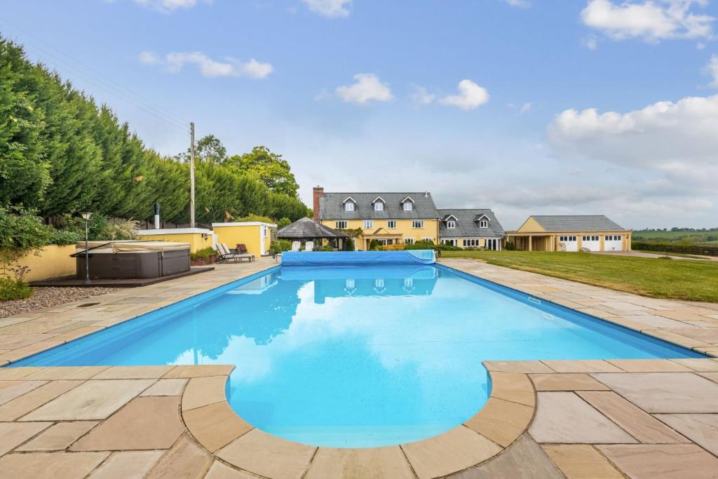an image of a swimming pool at a house at Broadridge Manor in West Worlington