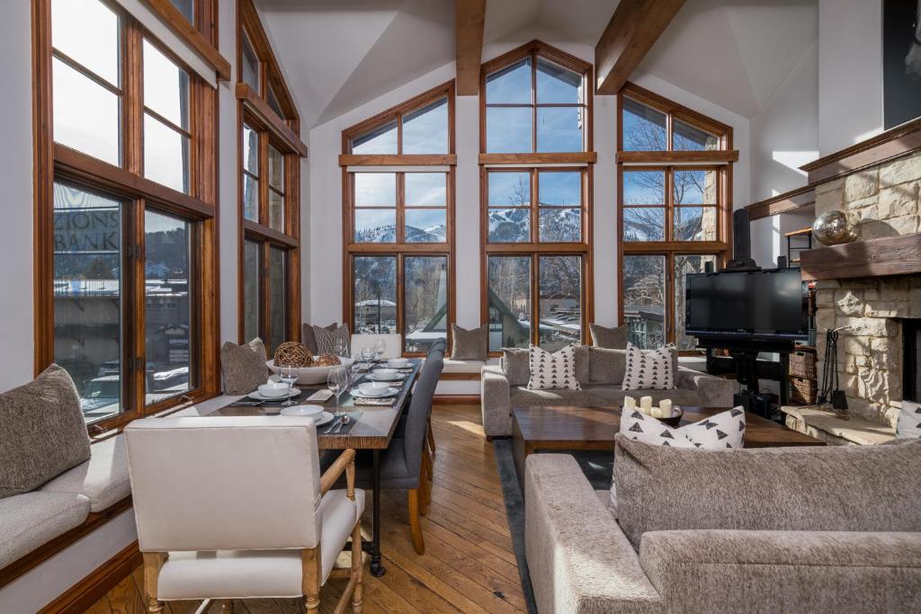 a living room filled with furniture and a fireplace at Colonnade Residence 11 in Ketchum