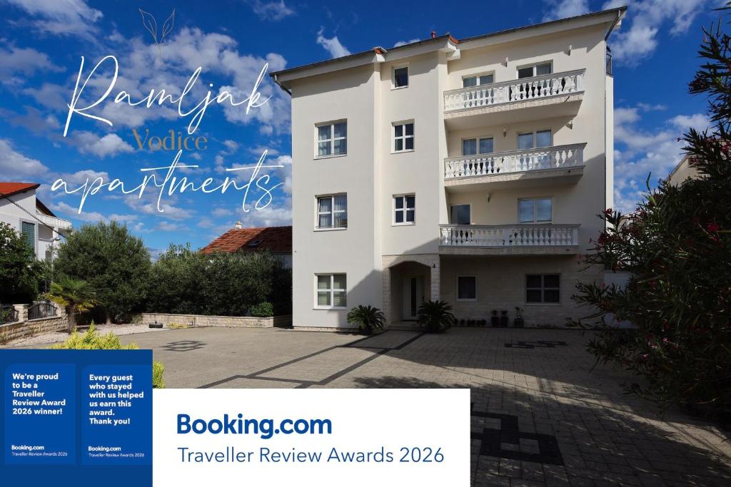a picture of a building with the wordsgraduate value apartments at Apartment R A M L J A K - Apartman "Rafael" in Vodice