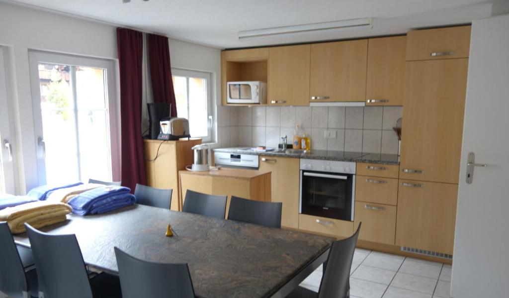 Kuchyň nebo kuchyňský kout v ubytování Royal Swiss Apartments