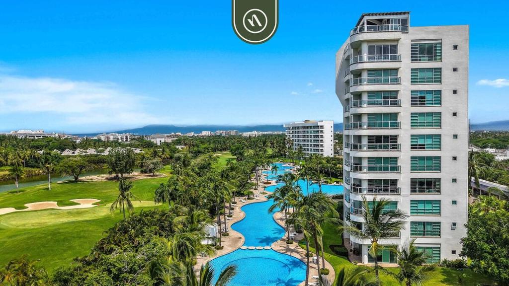 an aerial view of a resort with a pool at New 2BR/2BA Nuevo Vallarta Condo | Pool, Beach in Nuevo Vallarta