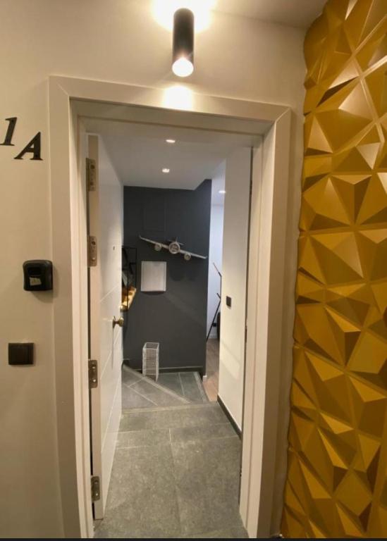 a hallway leading to a hallway with a wall with at San VICENTE in Vigo
