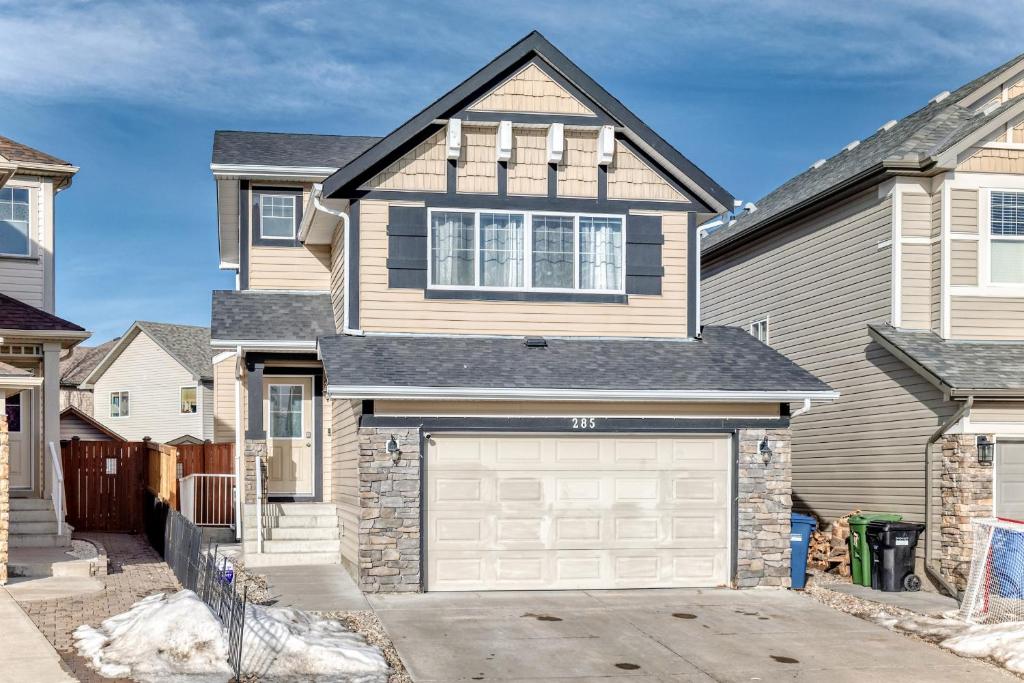 a house with a garage at Cozy Vacation Home in Calgary
